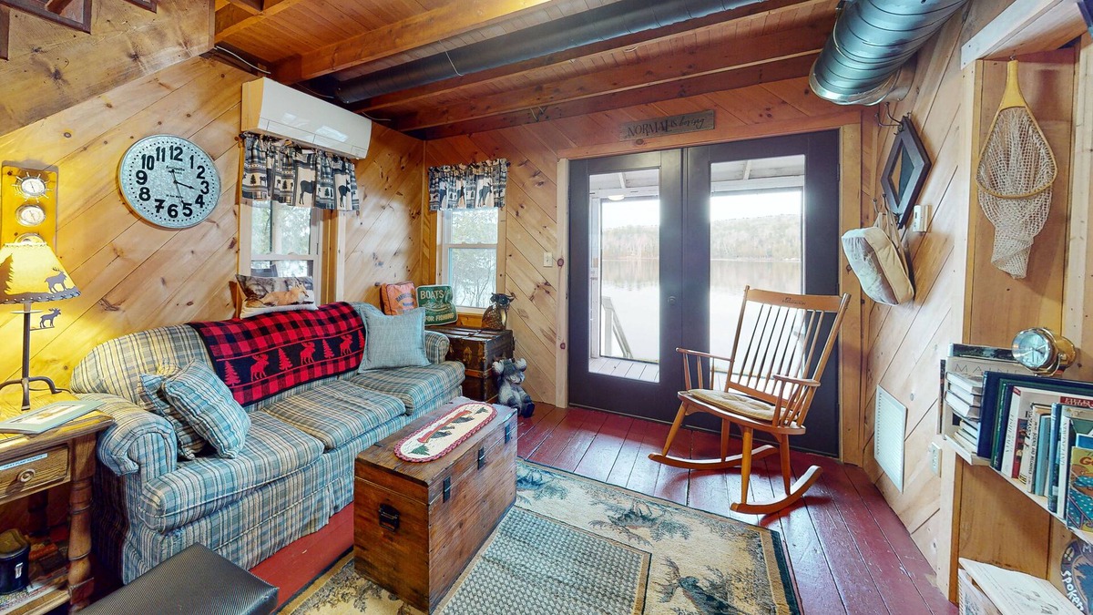 Oquossoc Cabin | Lakefront cabin with screened porch, woodstove, & water access - dog-friendly