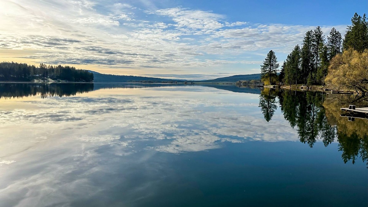 Nine Mile Falls House | Lakefront chalet with dock, firepit, pizza oven, fireplace, & 2 primary suites