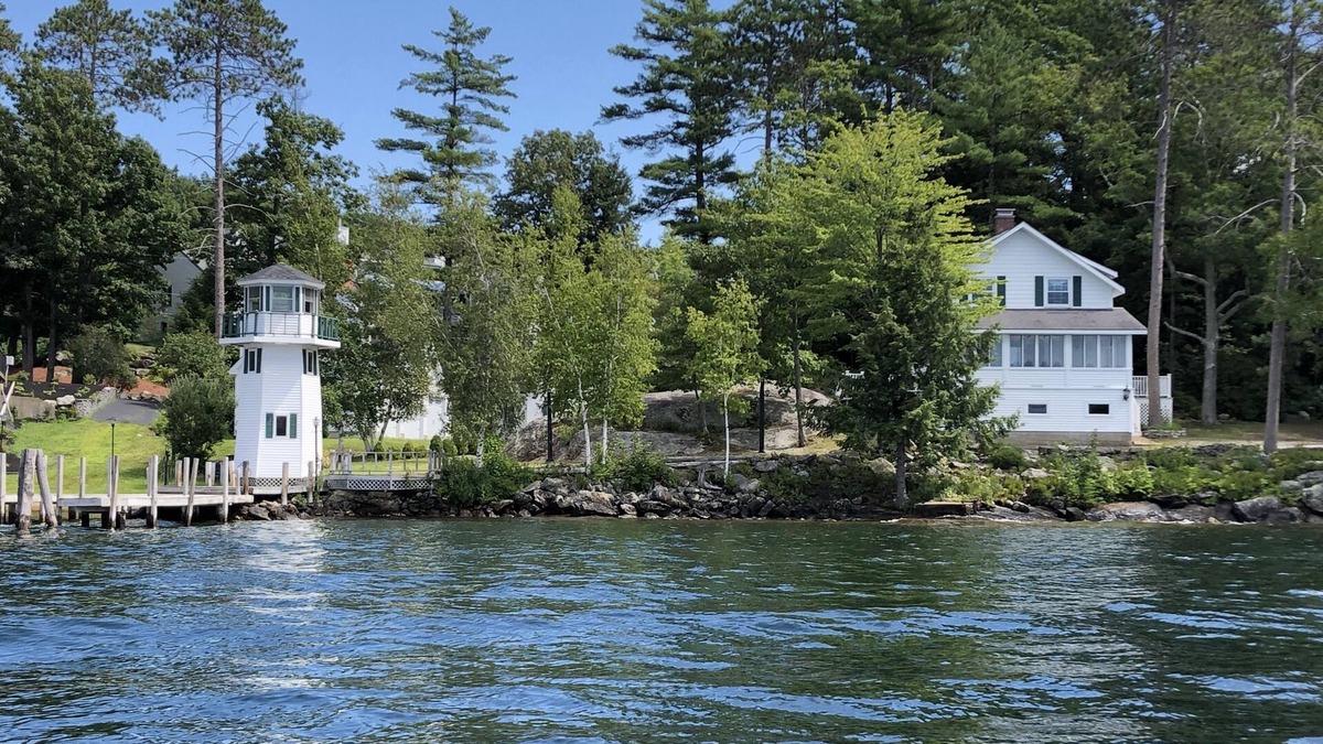 Laconia Cottage | Lakefront Cottage with Lighthouse and Dock on Lake Winnipesaukee
