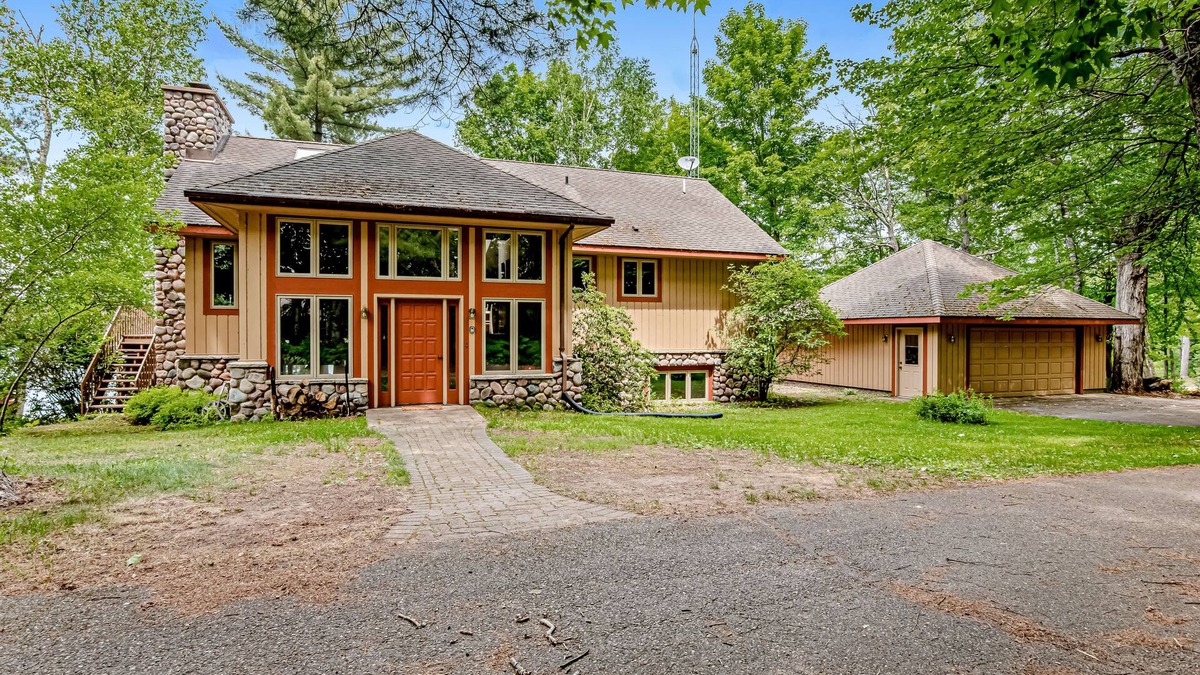 Manitowish Waters House | Lakefront, Dog-Friendly Home with Lake View, Dock, Central AC, & Wood Fireplace