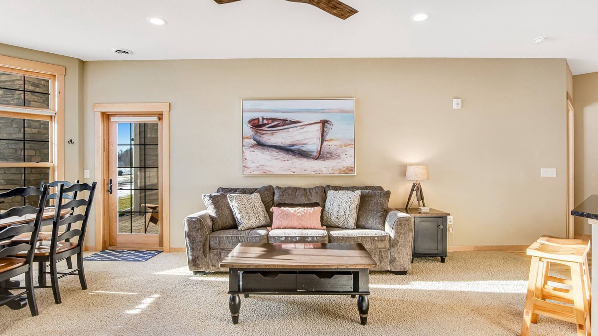 Three Lakes Condo | Lakefront, ground floor condo with indoor pool - fireplace, patio & washer/dryer