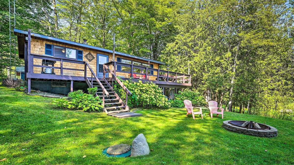 Curtis Township House | Lakefront Hideaway w/Dock, Kayaks, Fire Pit!