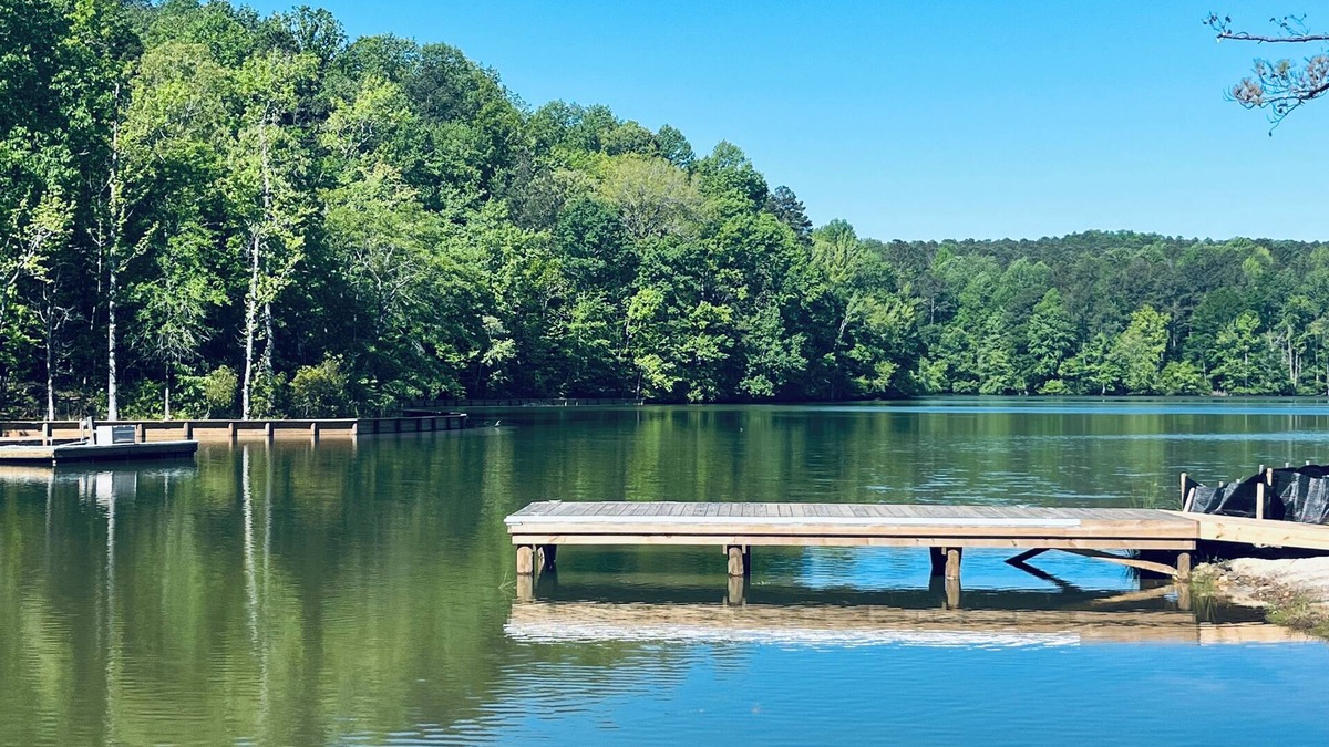 Dadeville House | Lakefront home. Beach. Kayaks. Dock. Outdoor fireplace & TV. Neighborhood Pool.