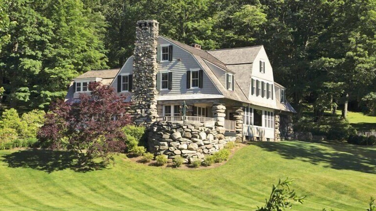 New Preston House | Lakefront Home set on five acres of land, deck, patio, lounge seating by...