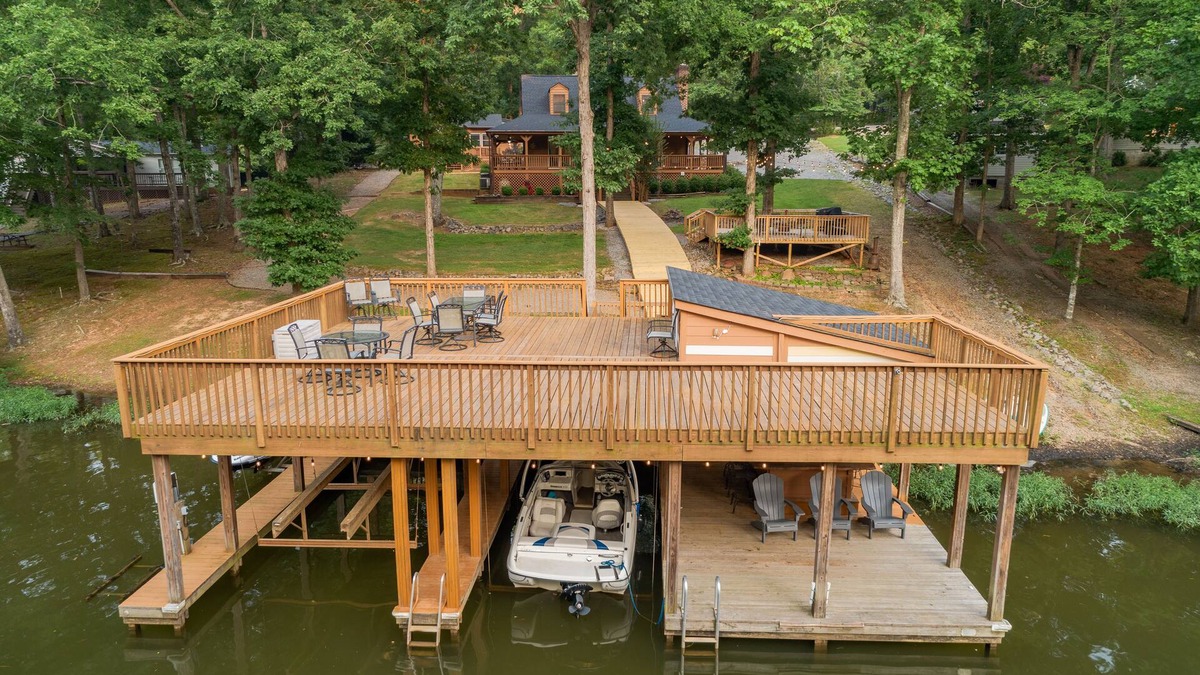 Wise Cabin | Lakefront Home w/Guest House, Tiki bar, Dock, Pet friendly, Kayaks,Peddle boats