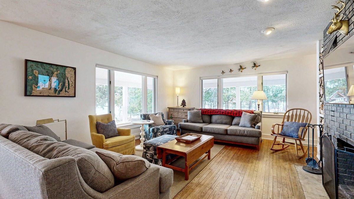 Alden House | Lakefront home w/large yard, sandy beach area, dock, & WIFI, near golf & trails