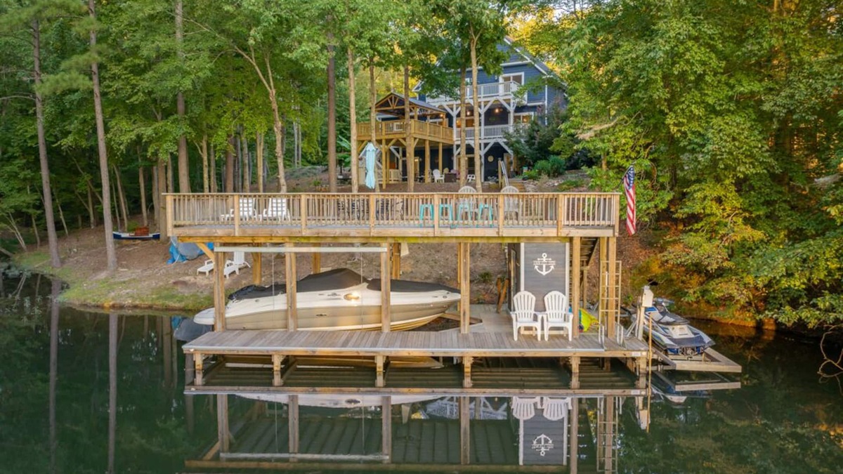 North Shore Acres House | Lakefront Home w/Pool, Lazy River, Dock, Firepit, Kayaks, Games, Pool Table