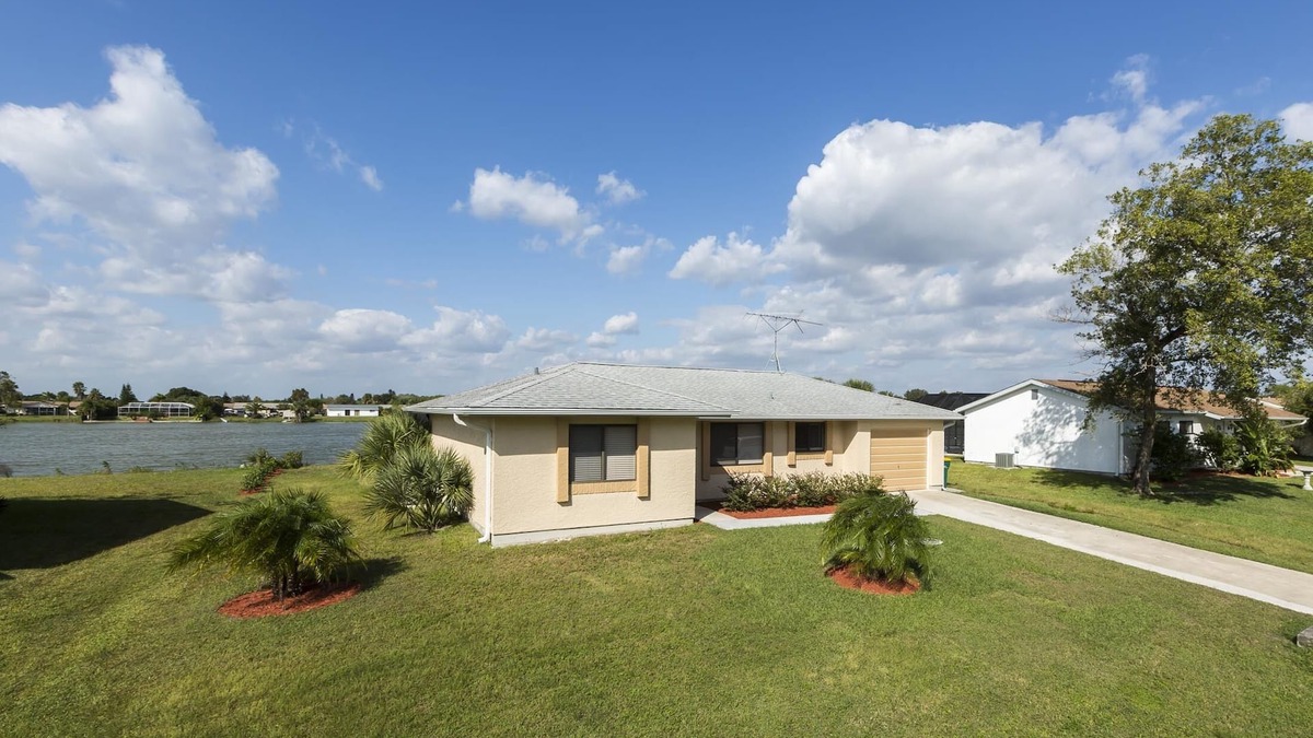 Port Charlotte House | Lakefront home with a vista and pool, free WiFi, near the State Natural Preserve