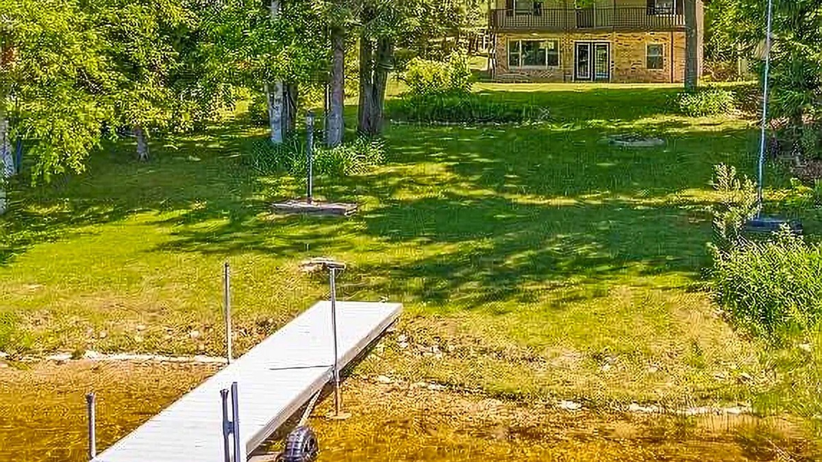 Johannesburg House | Lakefront home with large yard, dock, gas grill, WIFI near golf & ATV trails!
