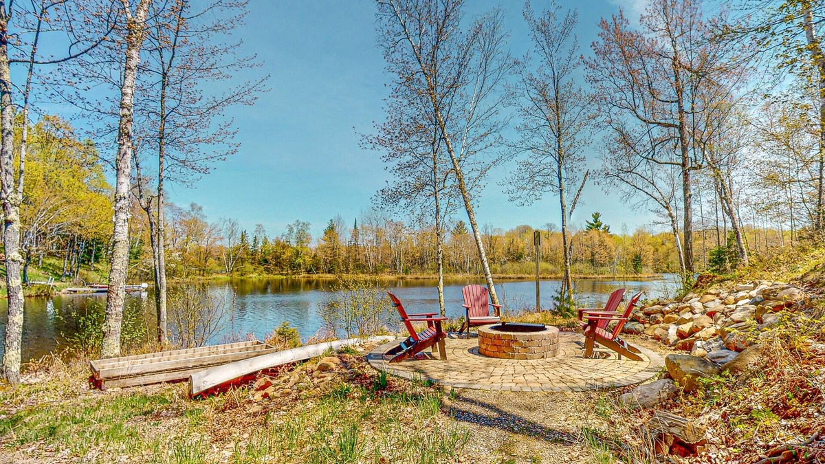 Presque Isle House | Lakefront home with large patio, fire pit, & a provided kayak