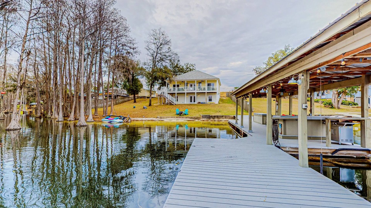 Marianna House | Lakefront home with amazing sunset/water view, private dock, & firepit