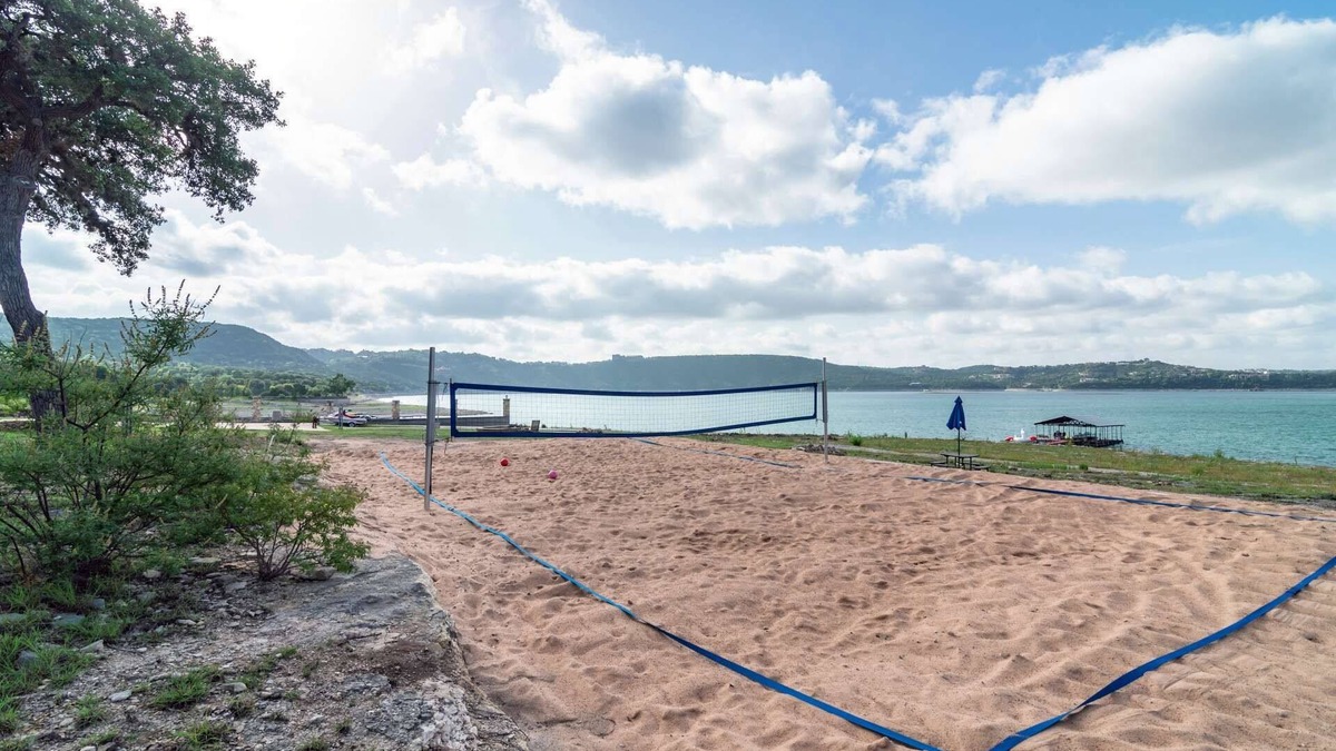 Comanche Trail House | Lakefront Home with Lake Views, Boat Dock, Sand Volleyball and Optional Bar and Game Room