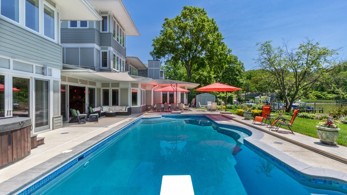 Annapolis House | Lakefront home with private pool, hot tub, outdoor space, central AC, & W/D