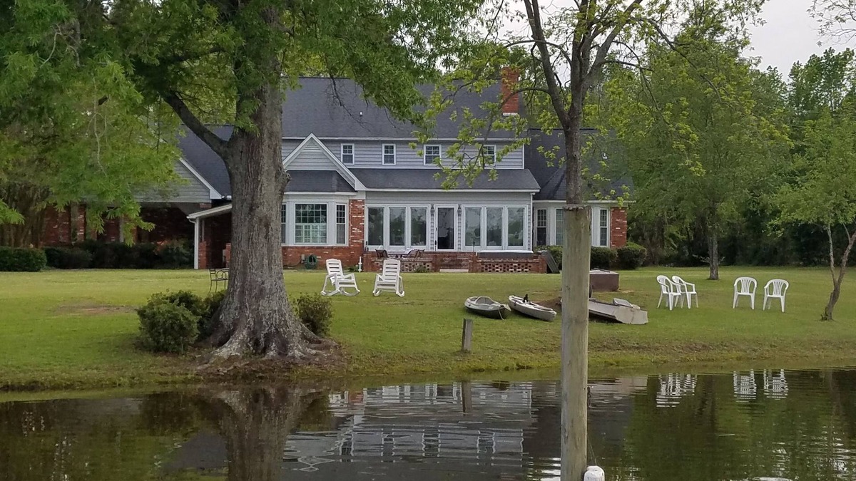 Summerton House | Lakefront Home with Private Dock and Outdoor Fireplace