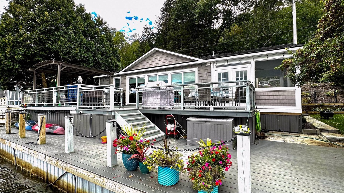 De Ruyter Cottage | Lakefront home with private dock, lake views, kayaks, grill, large covered deck