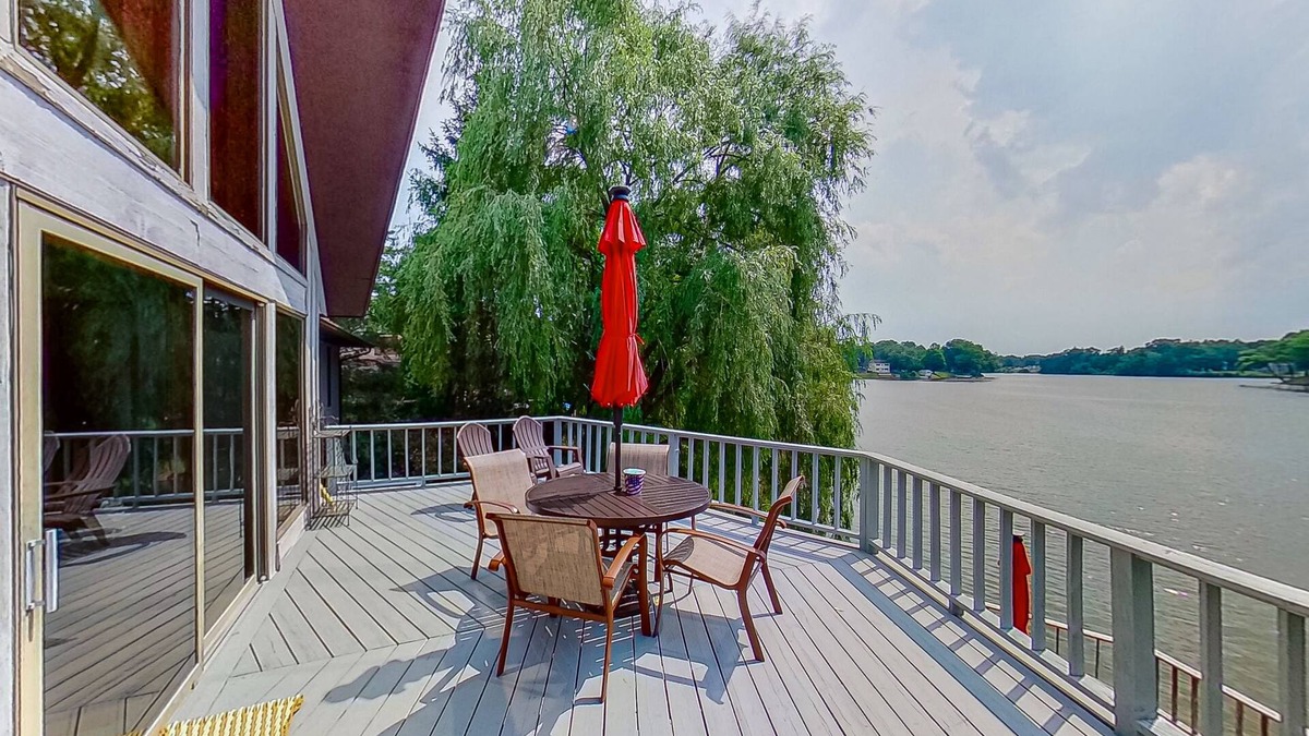 Paw Paw House | Lakefront home with spacious decks, lake views, hot tub, gas grill, & W/D