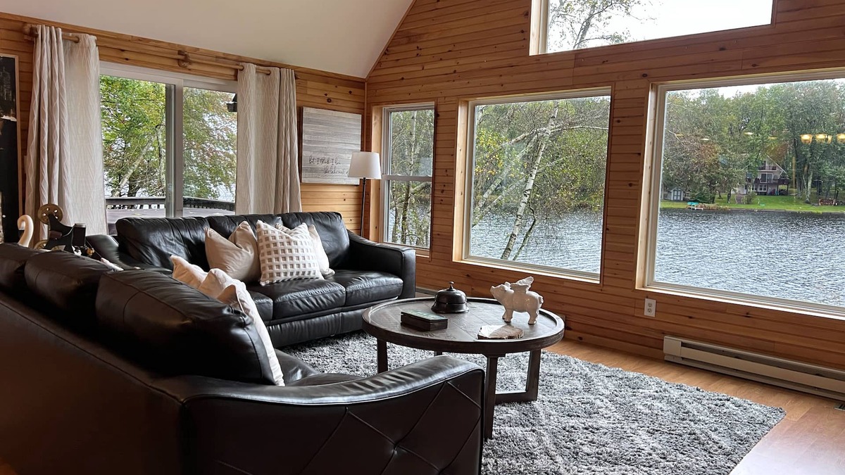 Pocono Lake House | Lakefront - Hot Tub, AC, 7 Paddleboards, Canoe, Kayak, Golf Car, Fire Pit, Boat