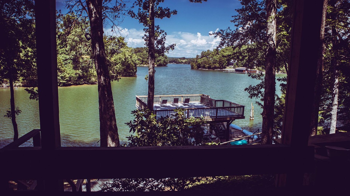 Ten Mile House | Lakefront house with dock, huge porch, game room