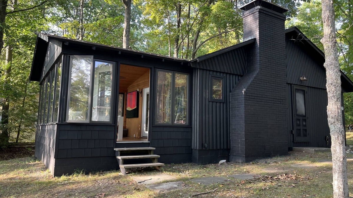 Carp Lake Cottage | Lakefront Log Cabin with Contemporary touches