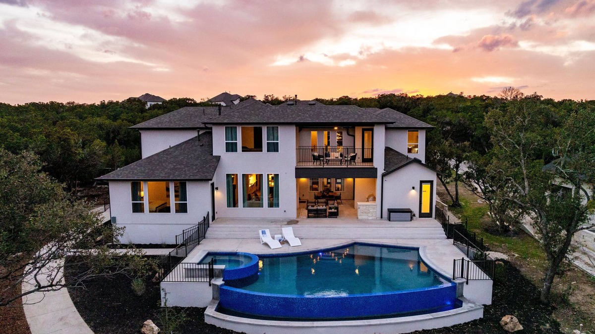 Jonestown House | Lakefront Luxury: 5,000 Sq Ft Retreat with Pool, Spa & Private Dock