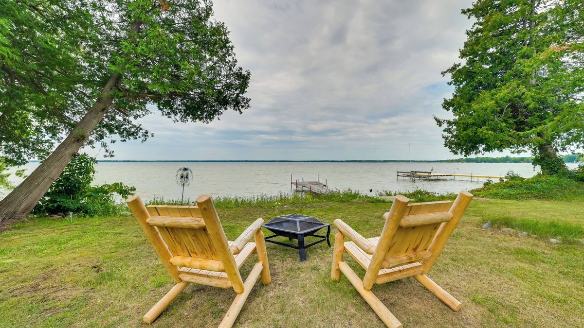 Cheboygan Cottage | Lakefront Michigan Abode w/Deck & Fire Pit!