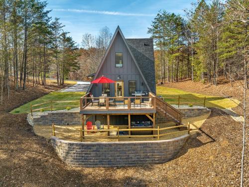 Mill Spring House | Lakefront, New, Private Dock, Hot Tub, Fire Pit, Canoe, Incredible Views