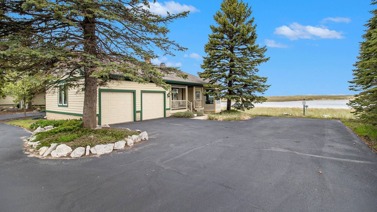 Manistee Condo | Lakefront Oasis at Harbor Village Beach