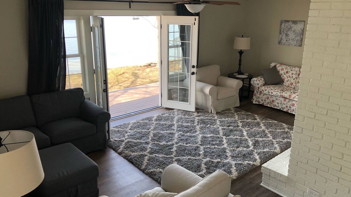 Lake Odessa House | Lakefront property with A/C sleeps 8 with onsite pontoon available to rent.