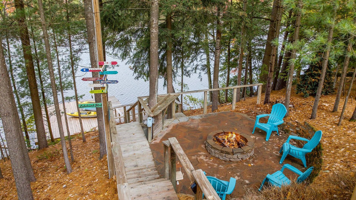 South Boardman House | Lakefront retreat 30 min to Traverse City. Hot tub, fire pit, kayaks, game room.