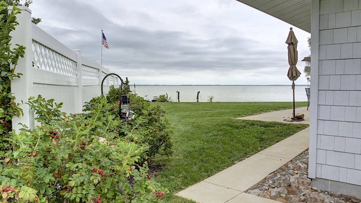 Port Clinton House | Lakefront Retreat in Port Clinton-Private Beach & Unique Caboose Stay!