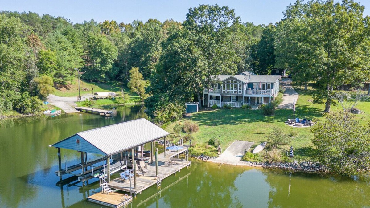 Goodview House | Lakefront Retreat w/ Game Room, Hot Tub, and Gym!