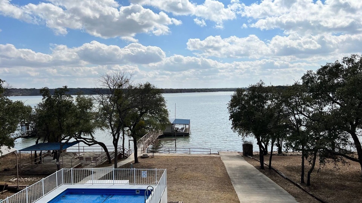 Brownwood House | Lakefront Retreat with Pool, on site Private Boat Ramp and 2 slip dock.