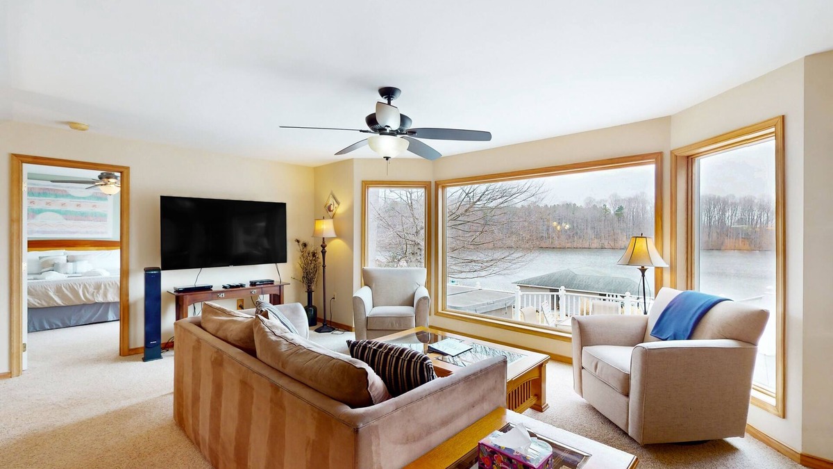 Livingston House | Lakefront retreat with views, hot tub, kid's play area, dock & fiber internet