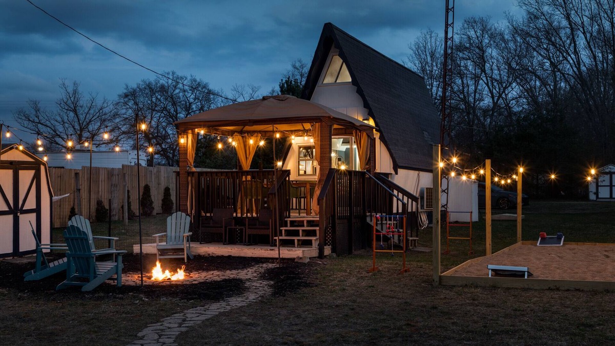 Bitely Cottage | Lakefront Tiny-Home w/ HotTub, Sauna, Pontoon, & Kayaks
