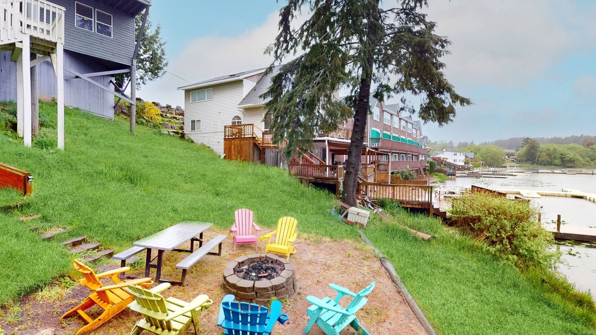 Lincoln City House | Lakefront townhome with electric grill, firepit, ping-pong table, & shared dock
