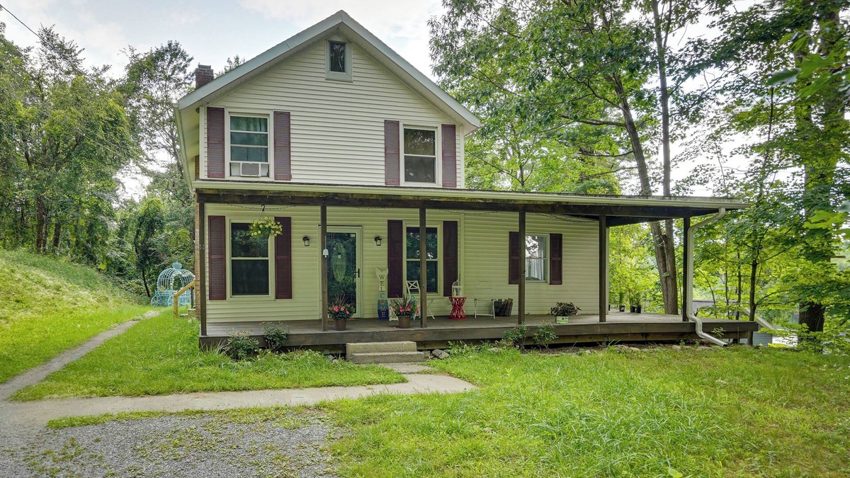 West Sand Lake House | Lakefront West Sand Lake Home w/Beach Access!