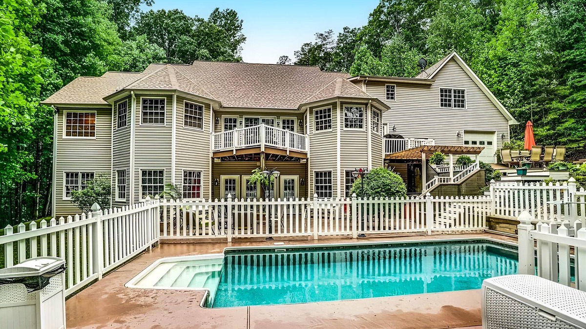 Mineral House | Lakefront with pool, hot tub, dock, SUPs, water carpet, billiards, foosball, gym