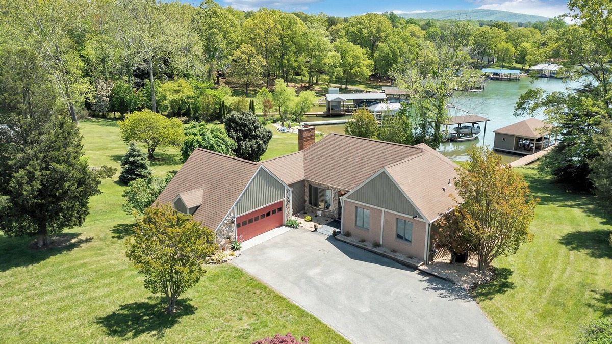 Huddleston House | Lakefront with Private Dock.