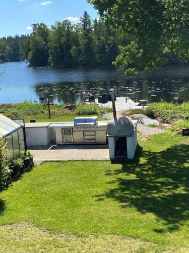 Malsryd House | Lakehouse med bastu, egen brygga och roddbåt