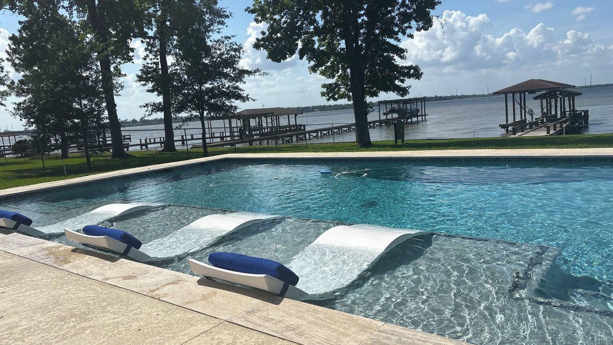 Lake Houston House | Lakehouse…Pool and Hottub. Waterfront property with boat dock.