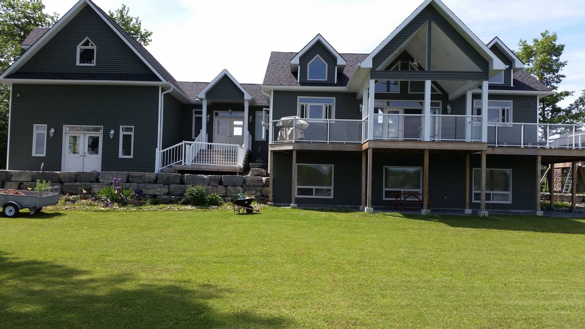 Brighton House | Lakehouse with 800 feet of waterfront near Prince Edward County!