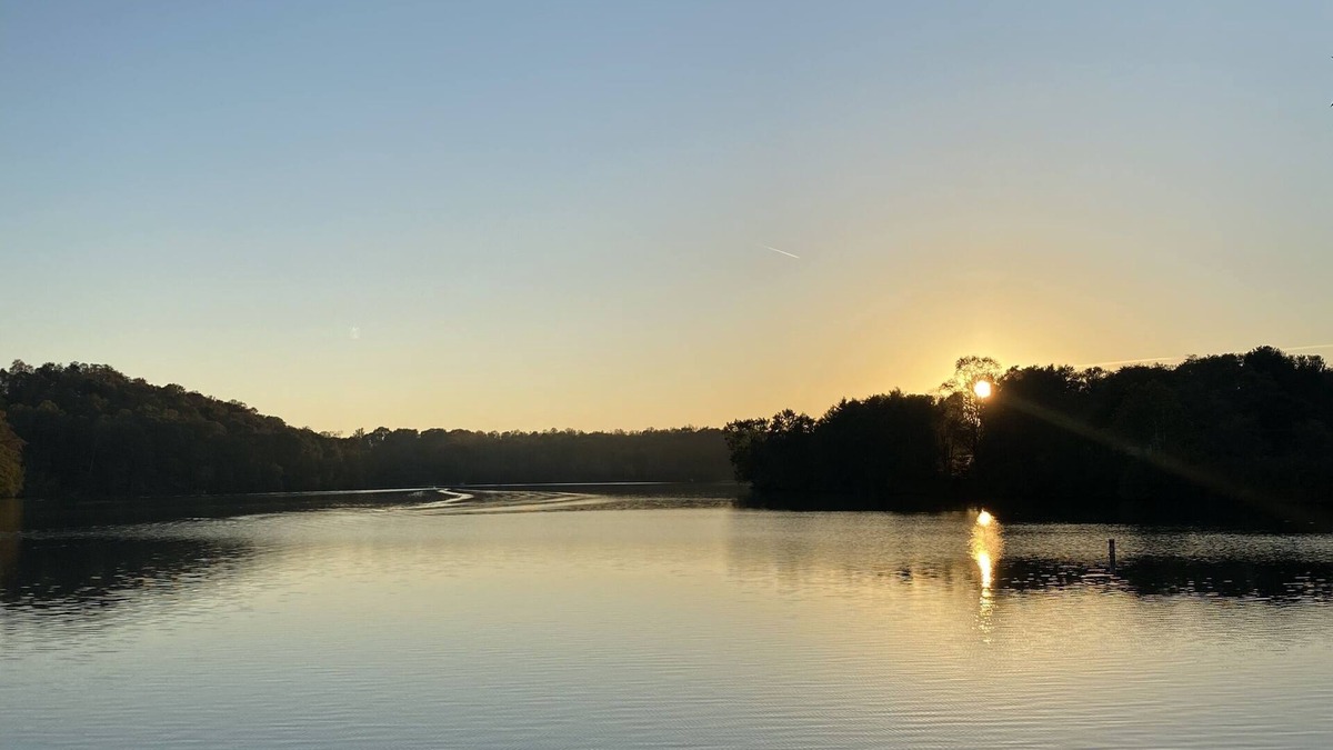 Logan Cabin | Lakeside Hideaway a spacious lodge with a lake view close to local attractions.