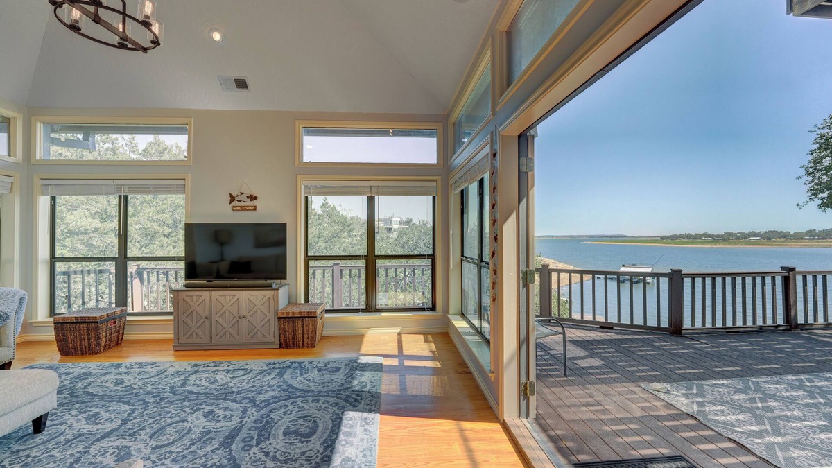 Burnet House | Lakeside Leisure - Peaceful waterfront home with a boat dock and game room.