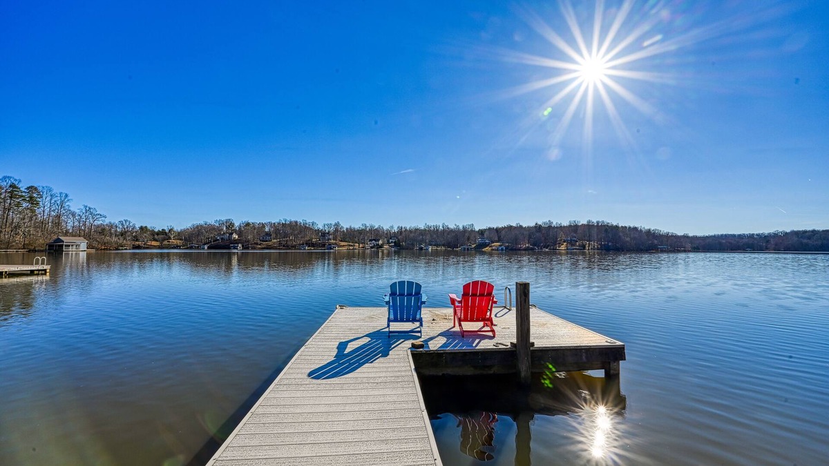 Orange House | Lakeside retreat with a firepit, dock, sprawling deck, pool table - dog friendly