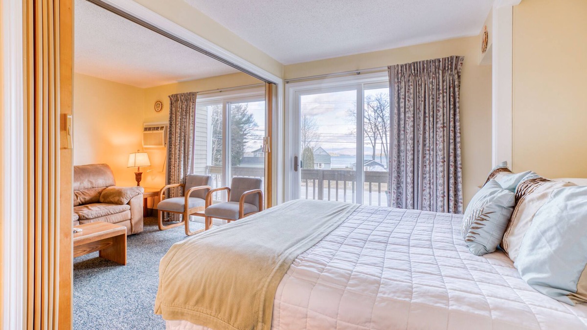 Gilford Condo | Lakeview condo with tennis, sauna, and a private beach