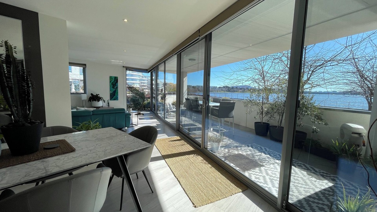 Kingston Condo | Lakeview Luxe - Pool, Gym, Tesla EV Charger - Prime Kingston Foreshore Location!