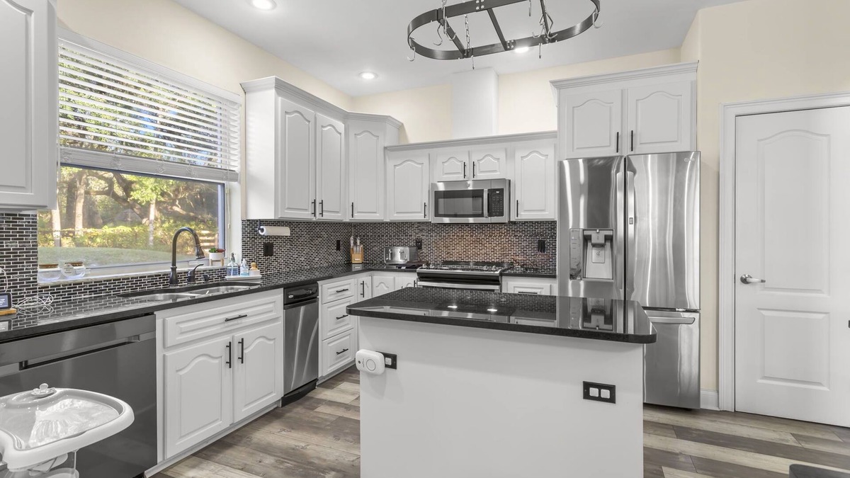 Port Richey House | Lakeview Poolside Retreat: Gated 3-Acre Paradise, Perfect for Events & Escaping!