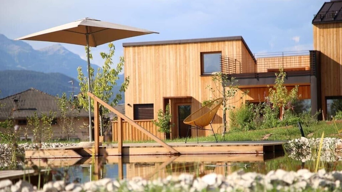 Sarnonico House | Landhaus Silene: new + modern wooden house with large natural garden and swimming pond