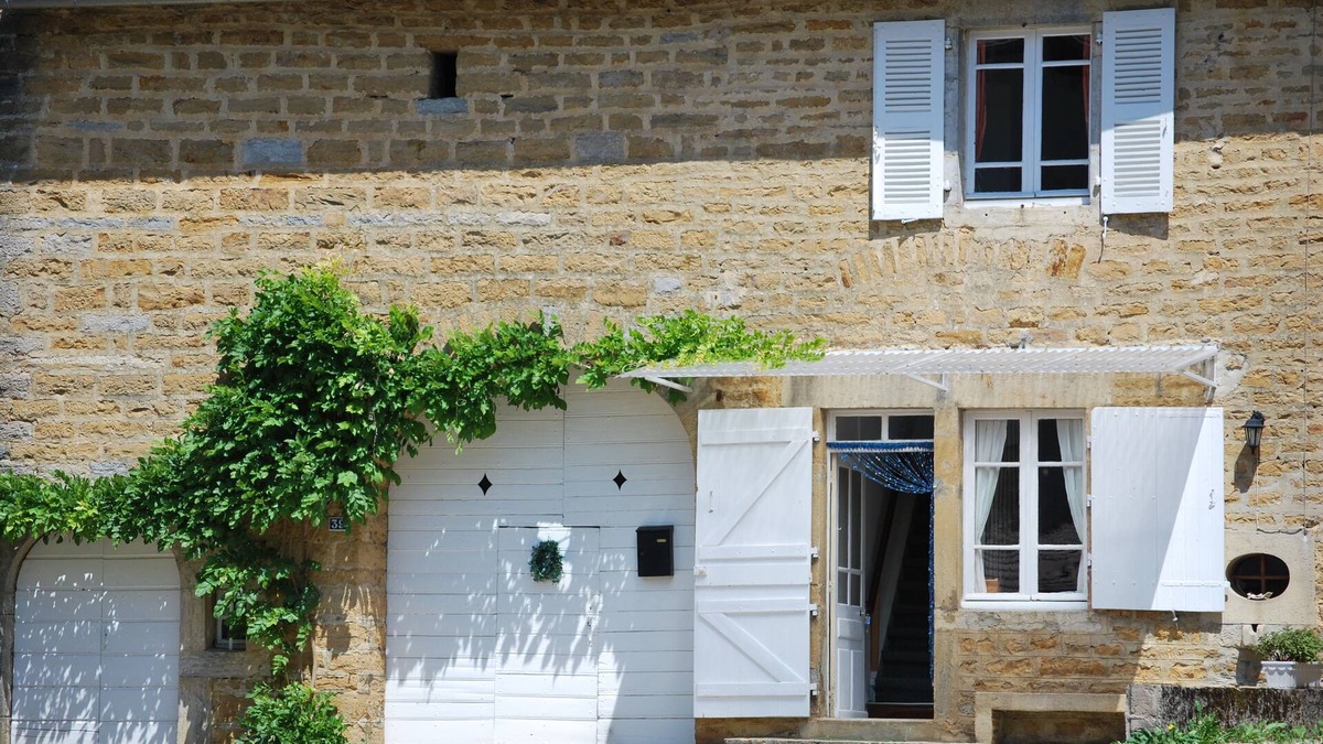 Frontenay House | Landmarked stone house by a stream with extraordinary charm