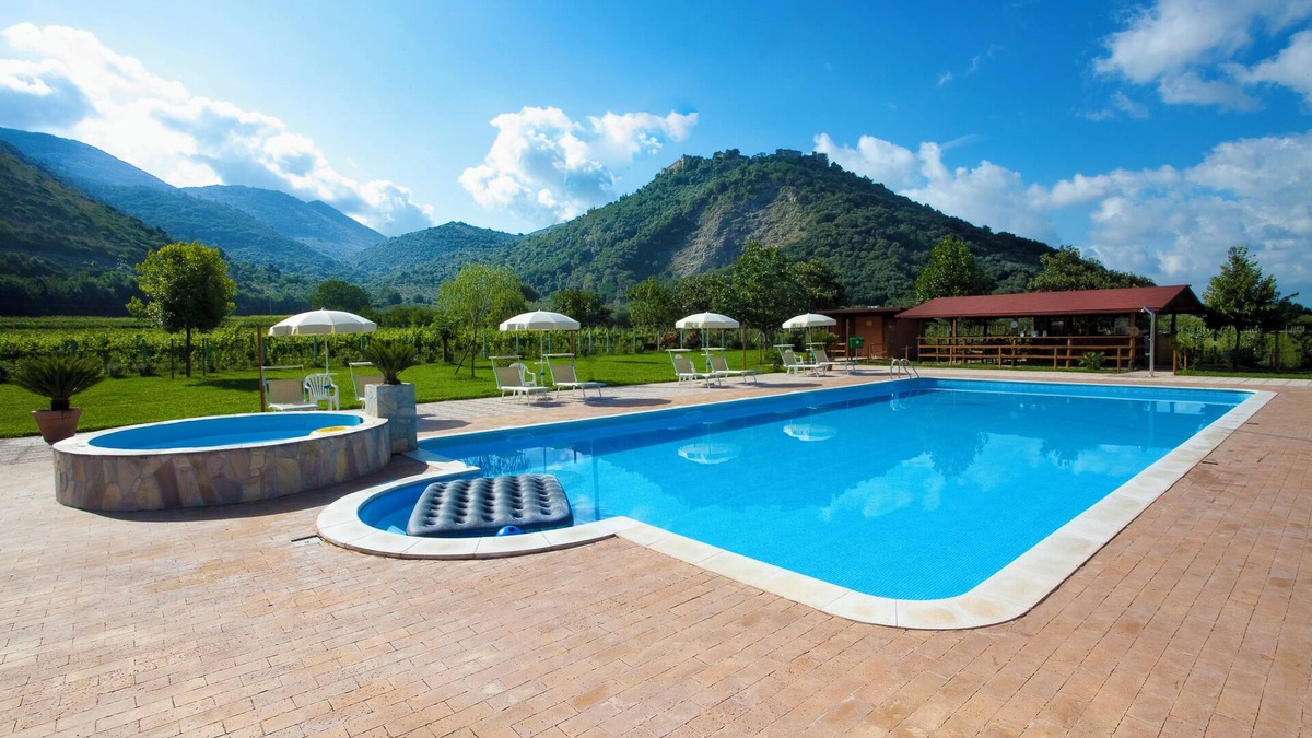 Sermoneta Apartment | Large apartment in a medieval stone Court, terrace, great view, pool use